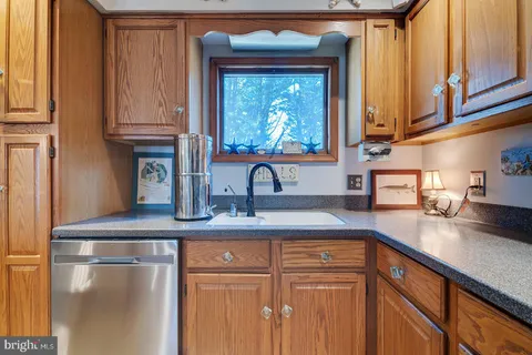 a bedroom with a bed furniture and a window