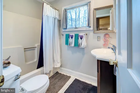 a view of staircase with wooden floor and stairs