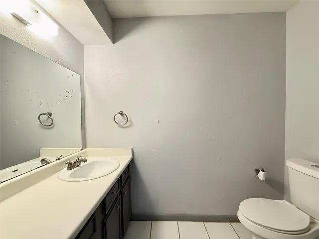 a view of a car parked in front of a building