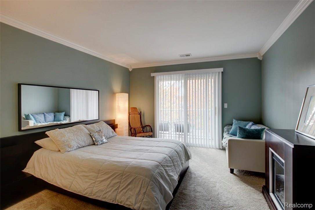 4117 Hampton Ridge Boulevard Howell, MI 48843 - Photo 13 of 22 Master suite walks out to the covered balcony.