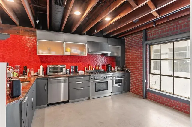 a view of a workspace with furniture