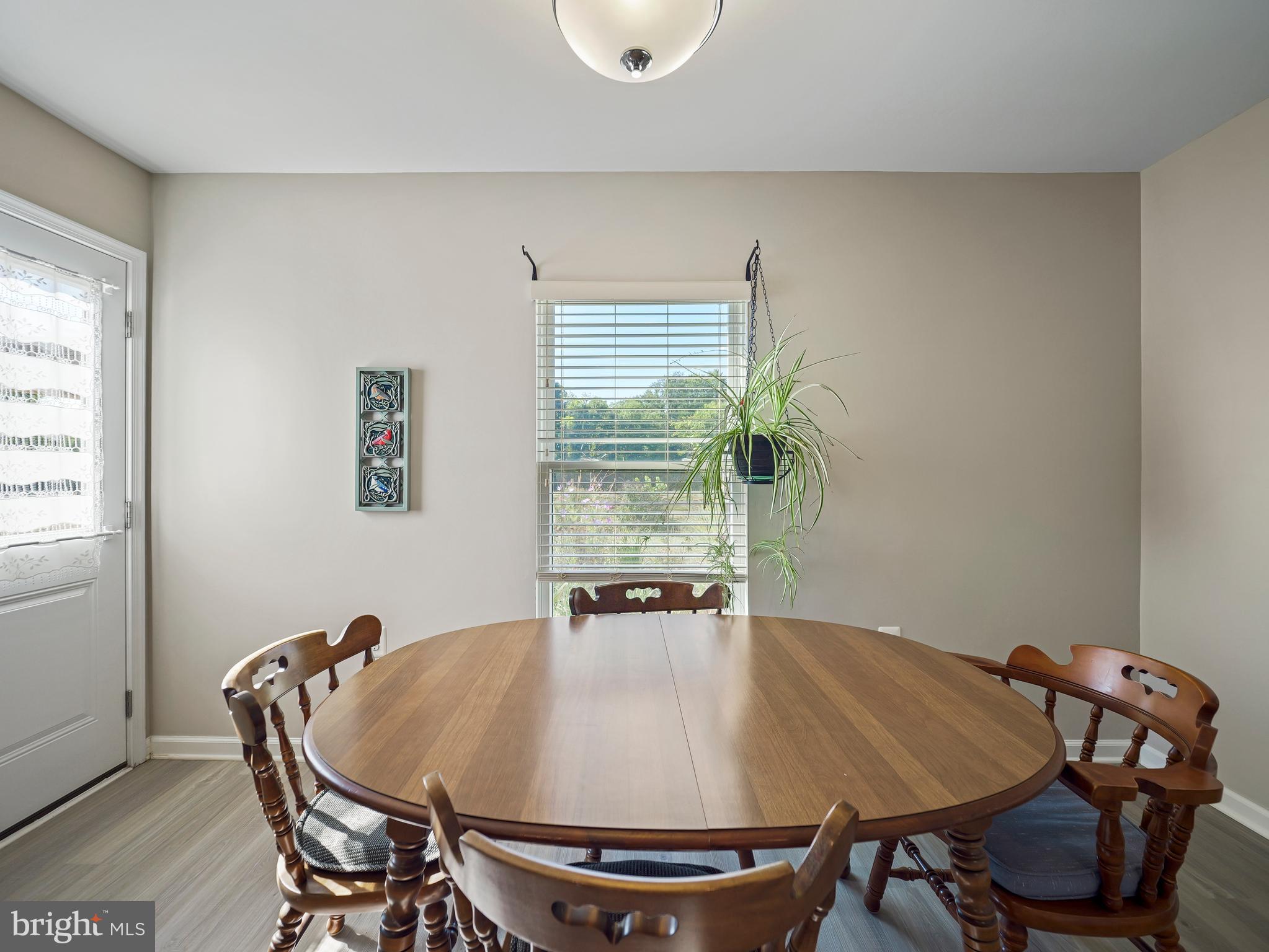 104 Rappahannock Run Falling Waters, WV 25419 - Photo 16 of 41 a dining room with furniture and window