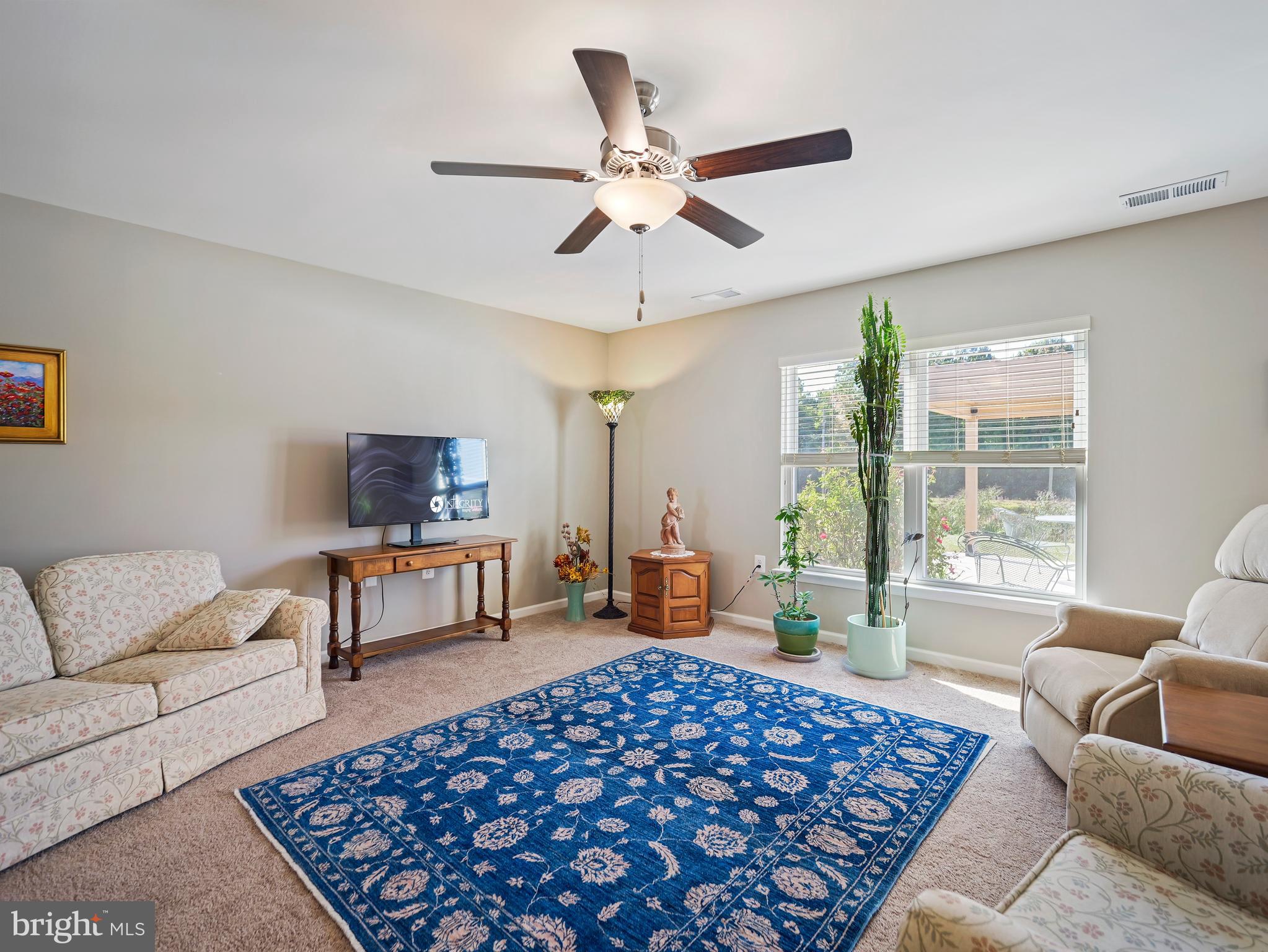 104 Rappahannock Run Falling Waters, WV 25419 - Photo 17 of 41 a living room with furniture and a couch