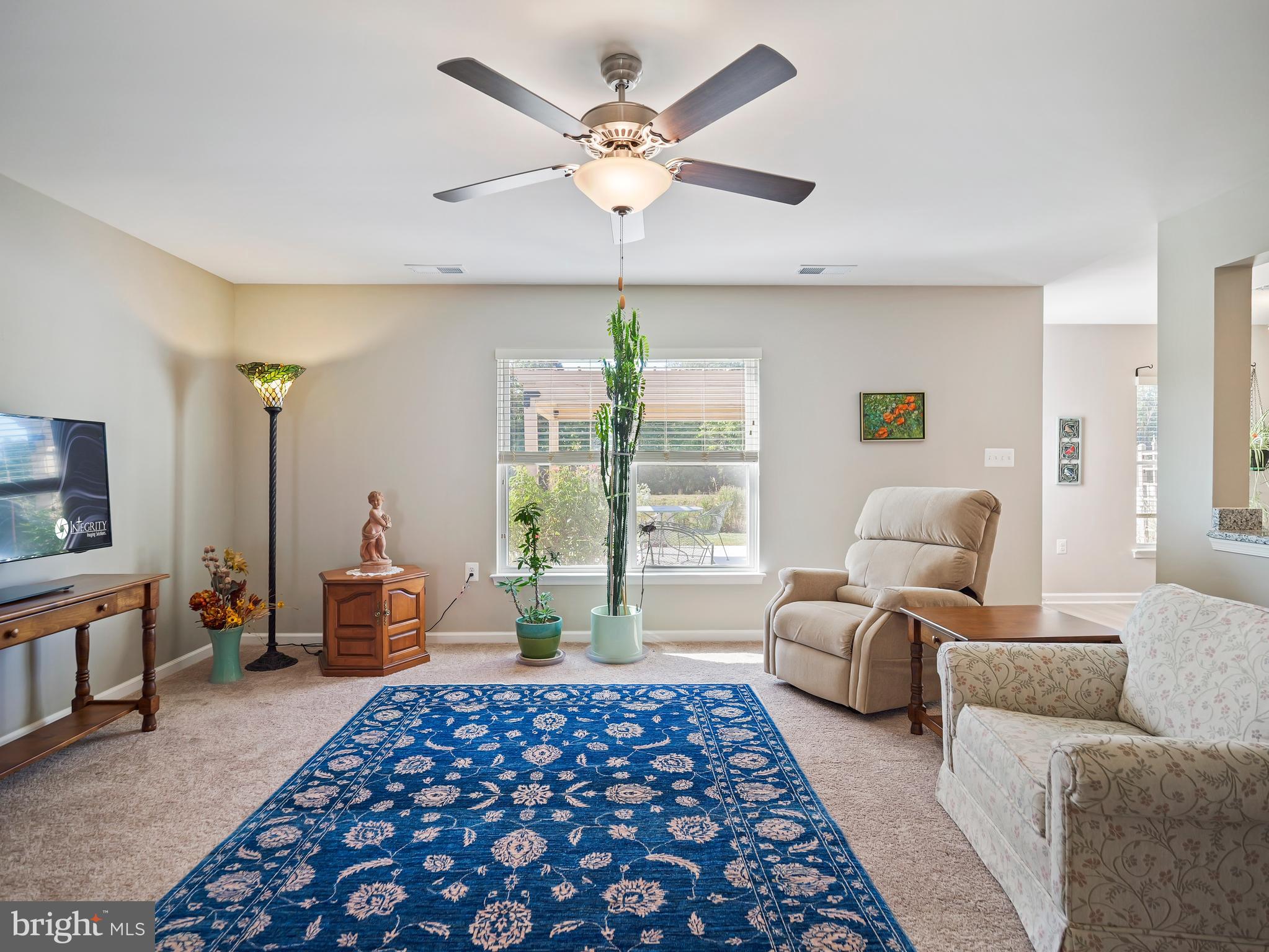 104 Rappahannock Run Falling Waters, WV 25419 - Photo 19 of 41 a bedroom with a large bed couch and a window