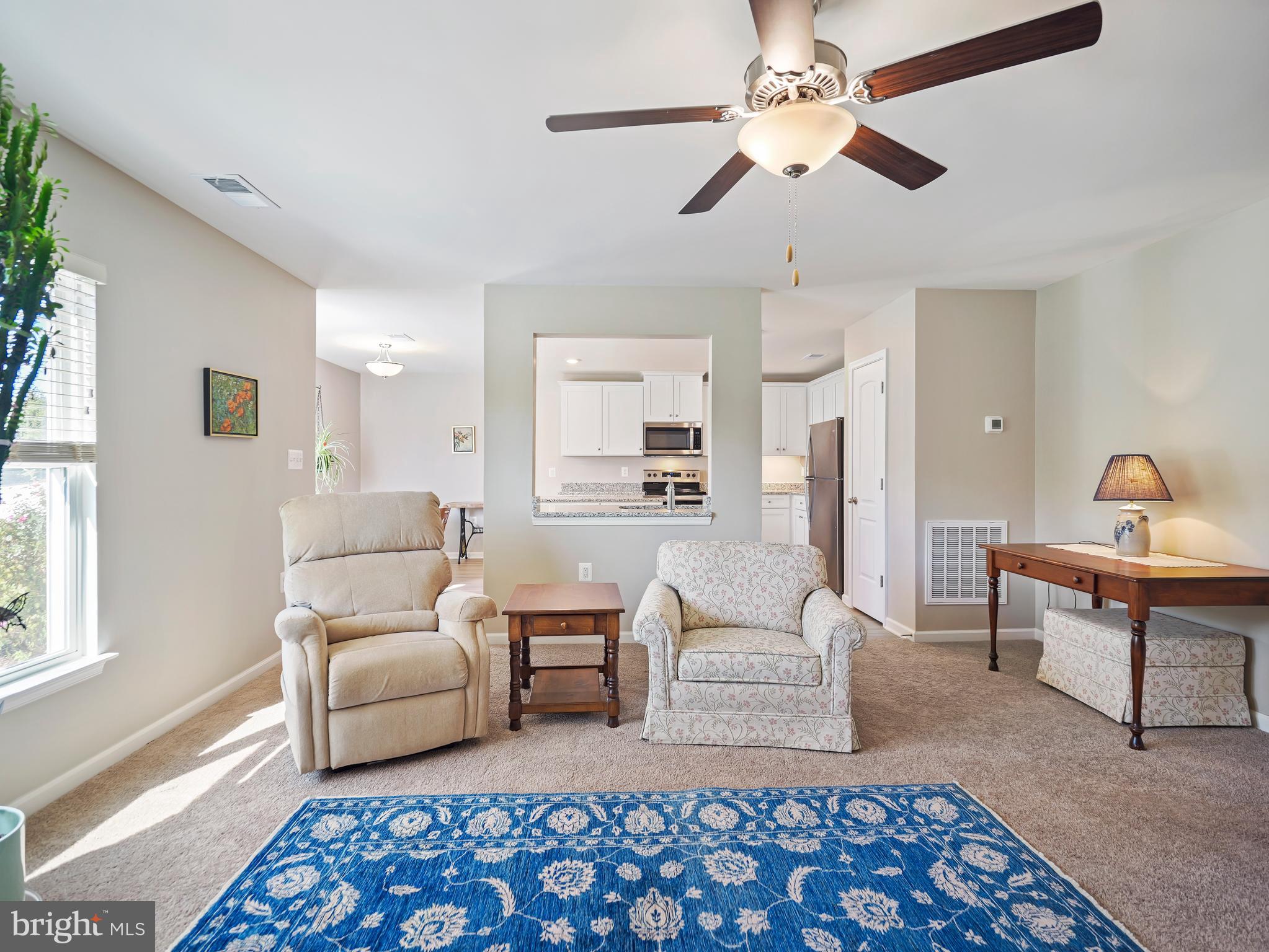 104 Rappahannock Run Falling Waters, WV 25419 - Photo 20 of 41 a living room with furniture and a rug