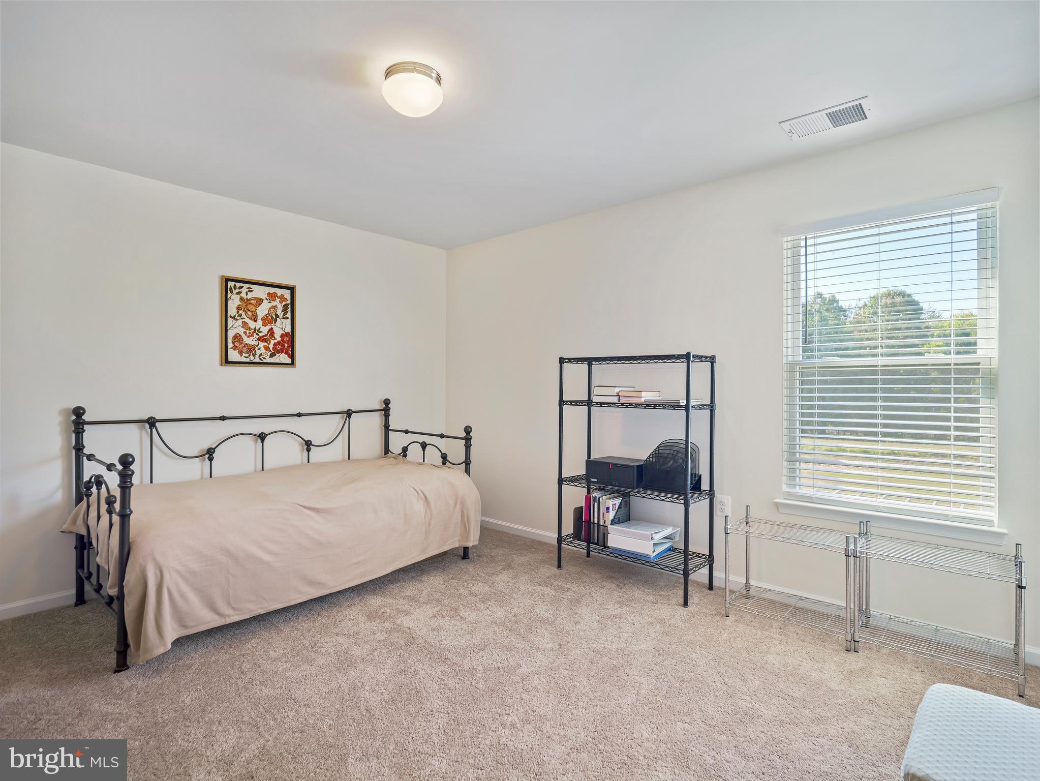 104 Rappahannock Run Falling Waters, WV 25419 - Photo 23 of 41 a bed room with a bed and a chair