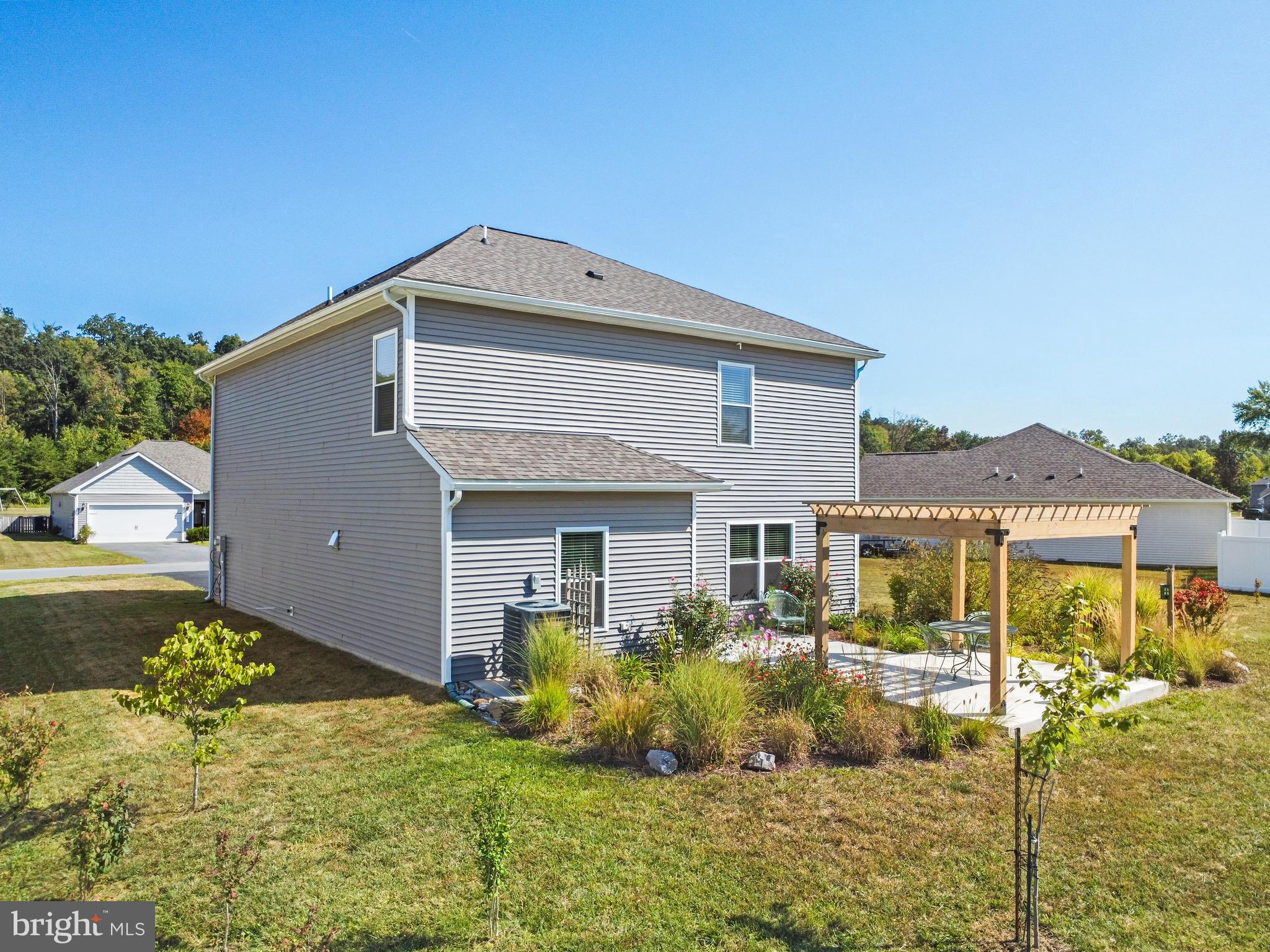 104 Rappahannock Run Falling Waters, WV 25419 - Photo 38 of 41 a front view of a house with a yard