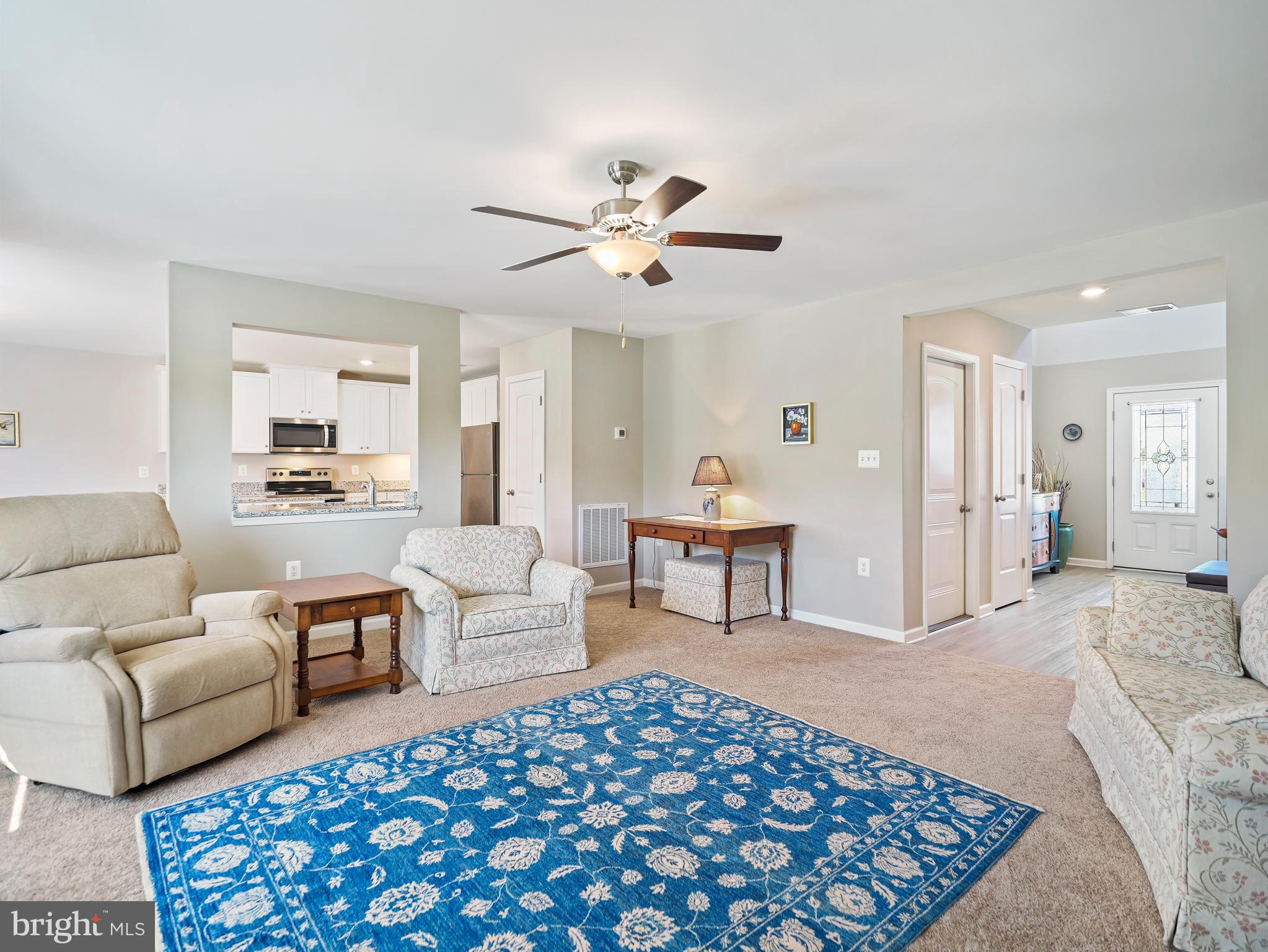 104 Rappahannock Run Falling Waters, WV 25419 - Photo 4 of 41 a living room with furniture and a rug