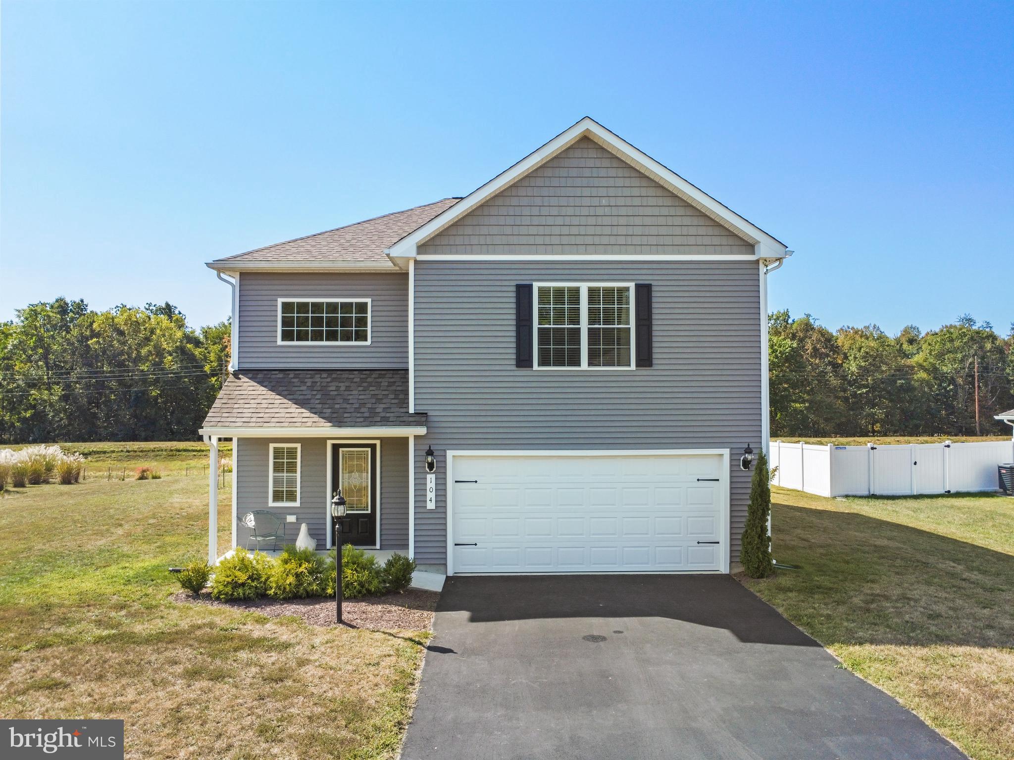 104 Rappahannock Run Falling Waters, WV 25419 - Photo 41 of 41 a front view of a house with a yard