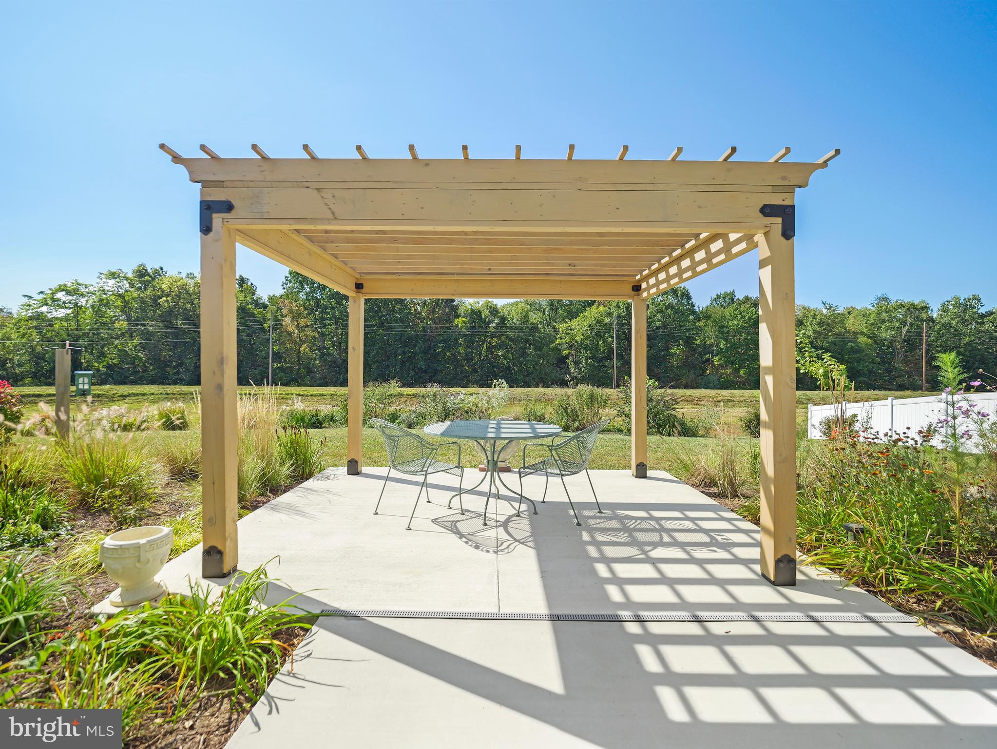 104 Rappahannock Run Falling Waters, WV 25419 - Photo 5 of 41 a view of a swimming pool with a patio