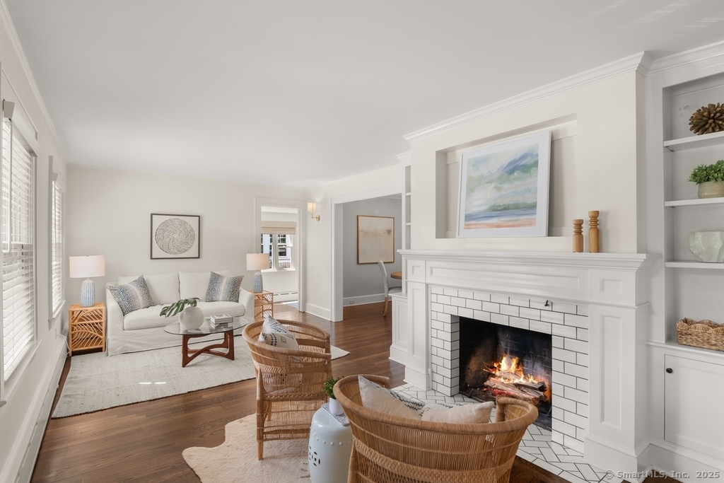 223 Middlesex Road Darien, CT 06820 - Photo 3 of 24 a living room with furniture and a fireplace