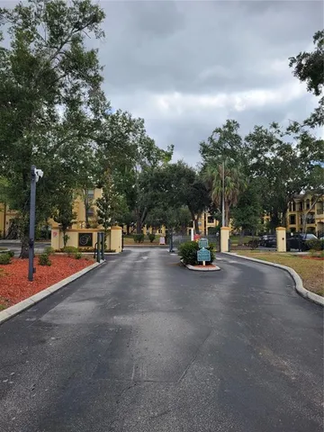 a front view of a house with large windows