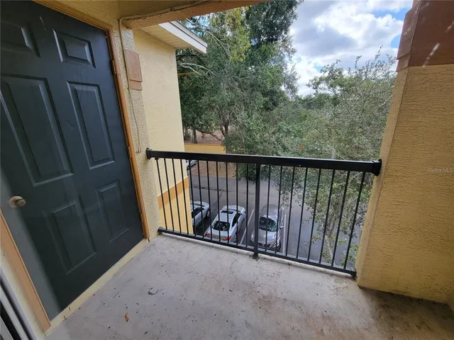 a view of a balcony with outdoor space