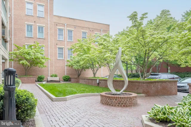 a garden view with a seating space