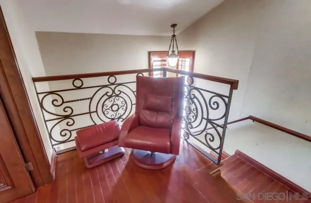 a view of entryway with wooden floor