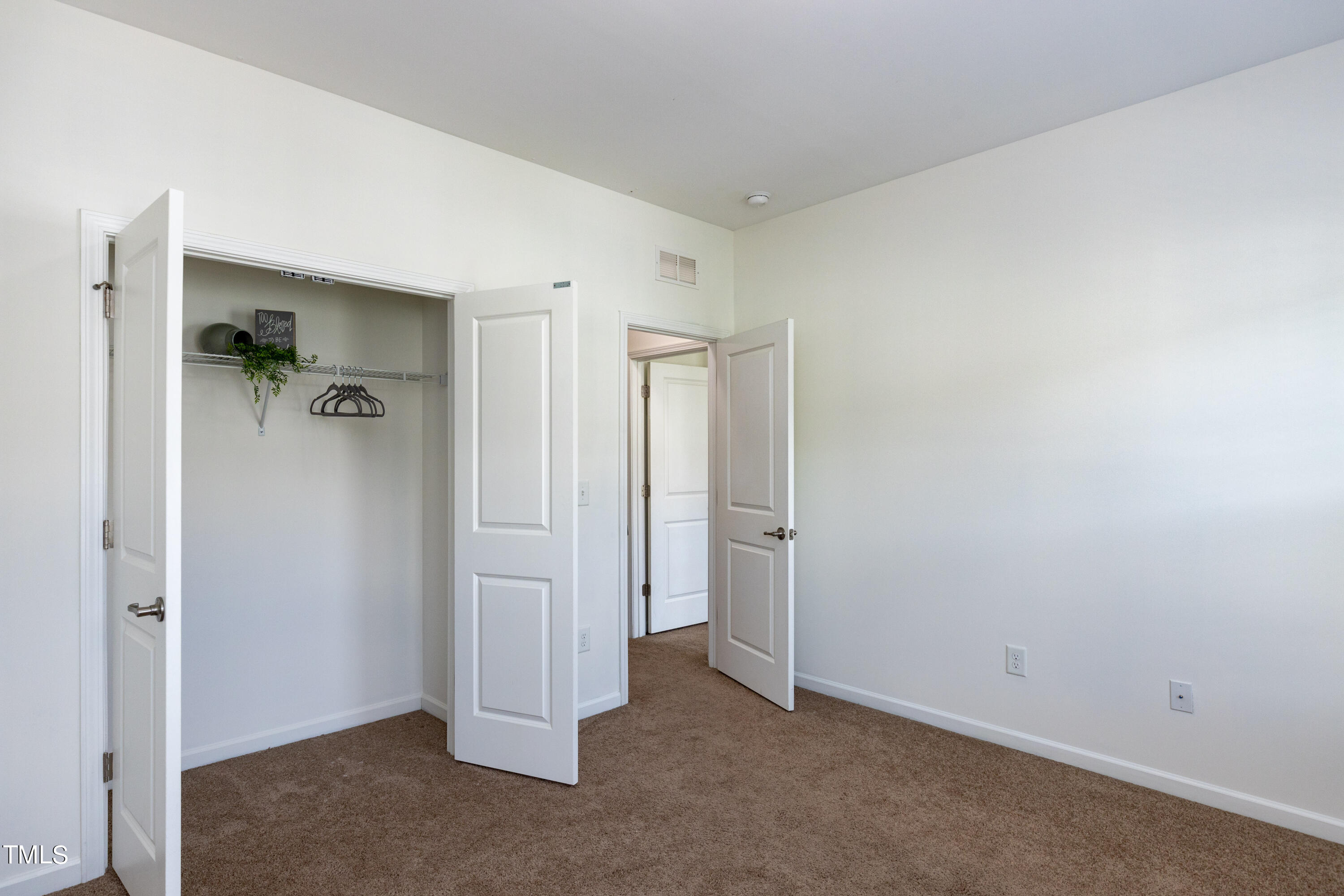 711 Edgewater Ridge Court Apex, NC 27523 - Photo 19 of 29 a view of an empty room