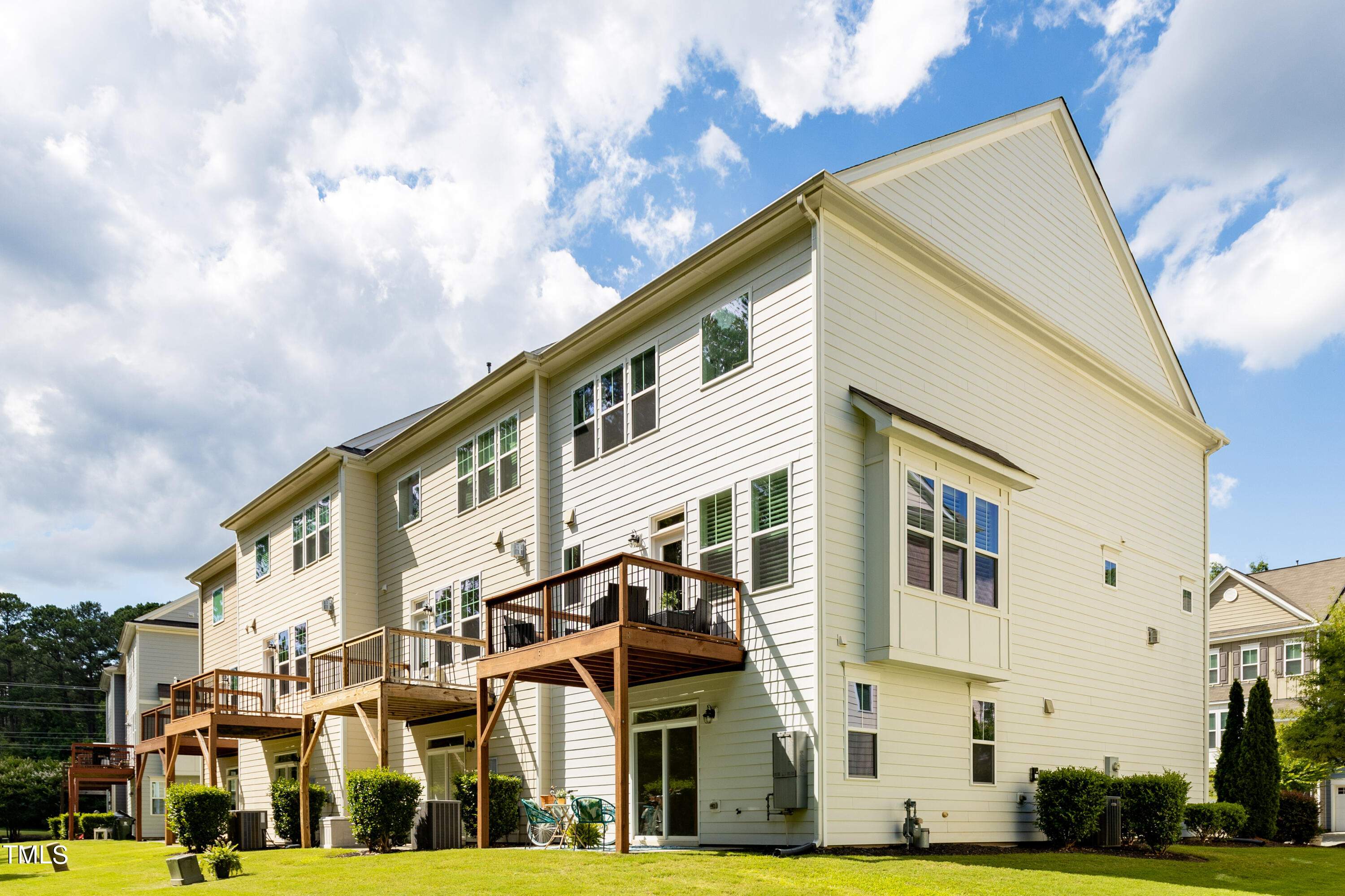 711 Edgewater Ridge Court Apex, NC 27523 - Photo 29 of 29 a front view of a building with lot of cars parked