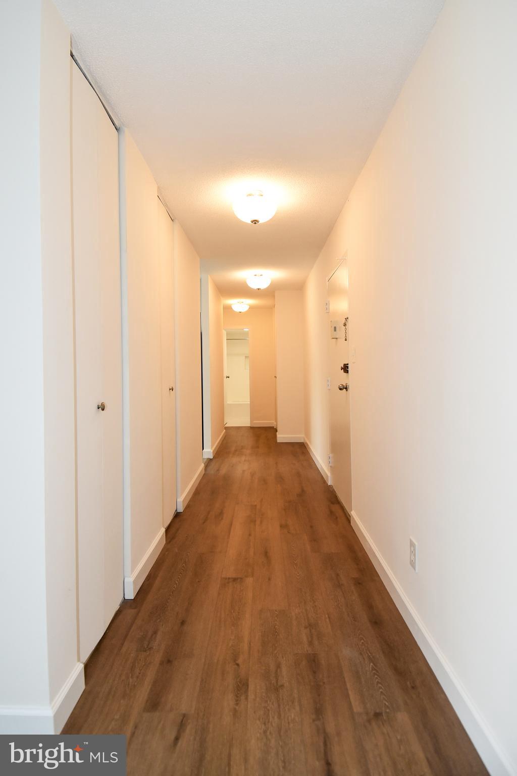 1301 South Arlington Ridge Road, Unit 308 Arlington, VA 22202 - Photo 17 of 45 Hallway with new luxury vinyl flooring
