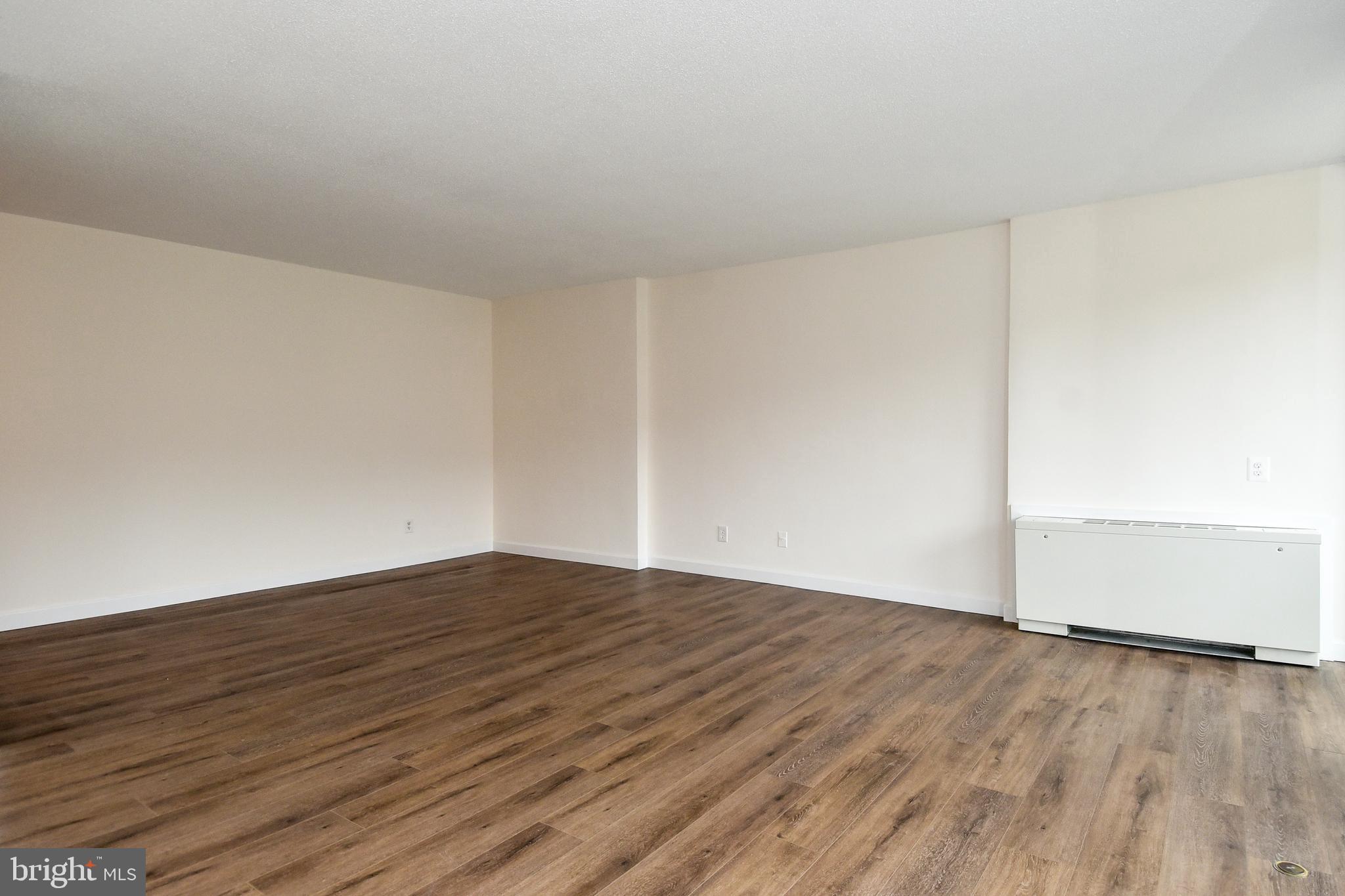 1301 South Arlington Ridge Road, Unit 308 Arlington, VA 22202 - Photo 9 of 45 Living Room with new luxury vinyl flooring