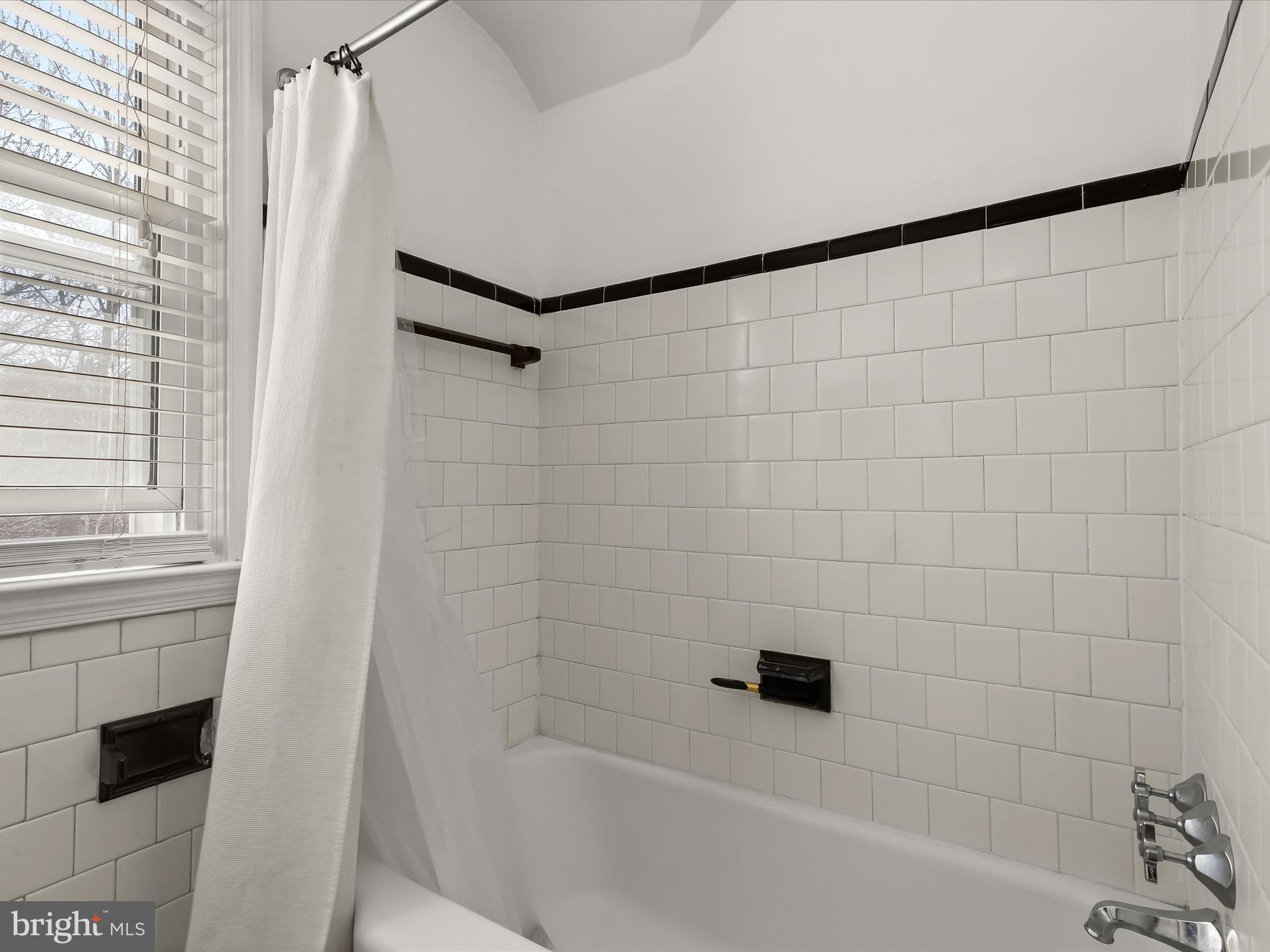 1632 Aberdeen Road Towson, MD 21286 - Photo 25 of 35 a bathroom with a bathtub and shower