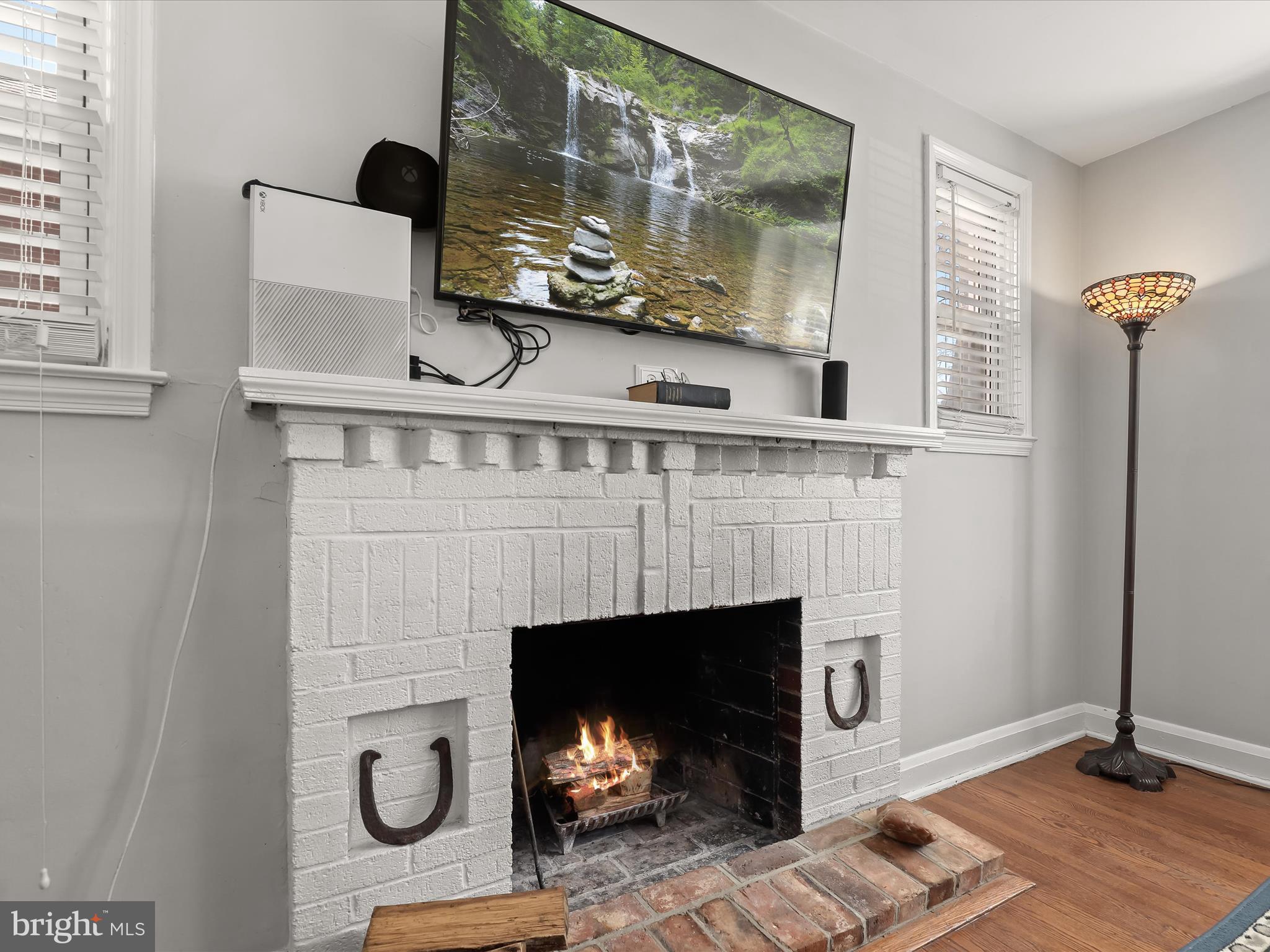 1632 Aberdeen Road Towson, MD 21286 - Photo 8 of 35 a living room with furniture and a fireplace