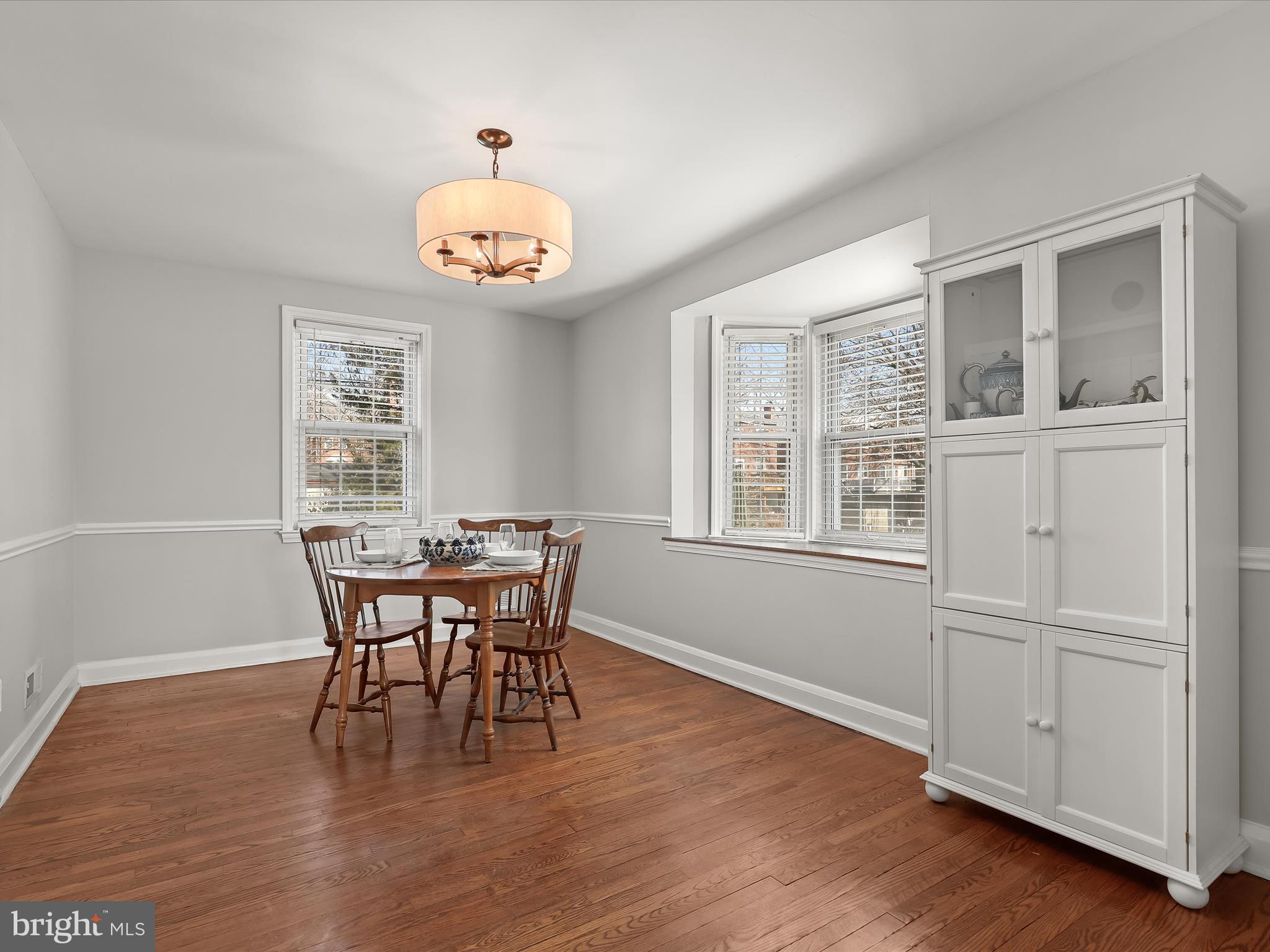 1632 Aberdeen Road Towson, MD 21286 - Photo 9 of 35 a view of a dining room with furniture window and wooden floor