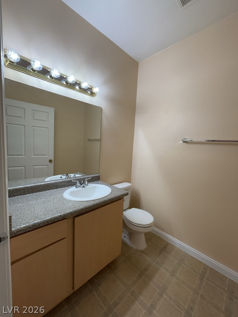 4915 East Russell Road, Unit 145 Las Vegas, NV 89120 - Photo 5 of 13 Bathroom with toilet and vanity