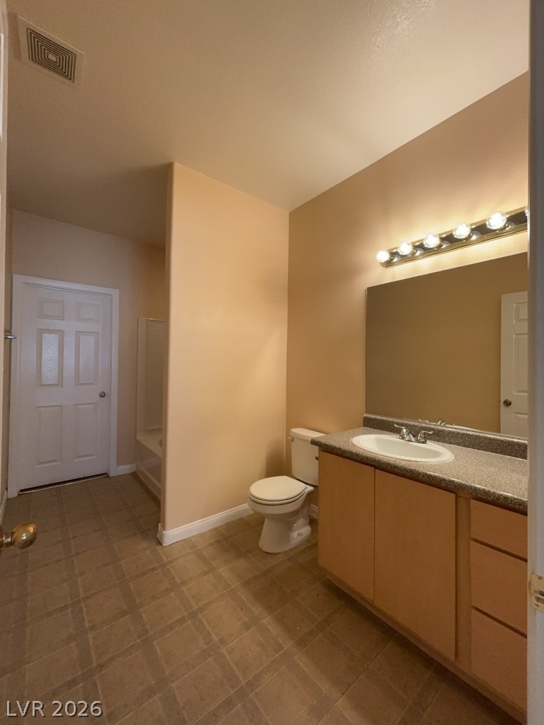 4915 East Russell Road, Unit 145 Las Vegas, NV 89120 - Photo 9 of 13 Full bathroom featuring vanity and a bathtub