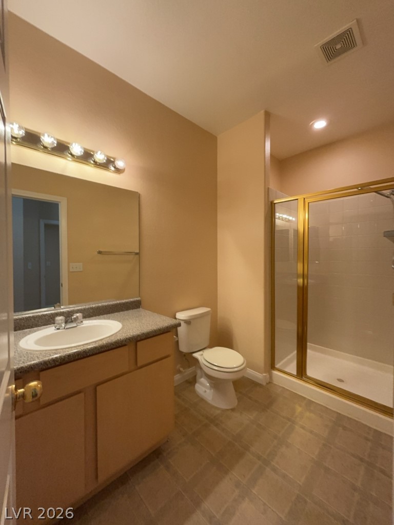 4915 East Russell Road, Unit 145 Las Vegas, NV 89120 - Photo 10 of 13 Full bathroom with vanity, a shower stall, and recessed lighting
