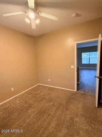 a view of a room with racks on the wall