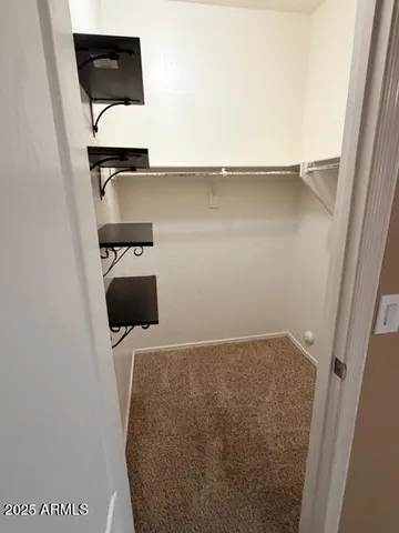 a view of a livingroom with a staircase