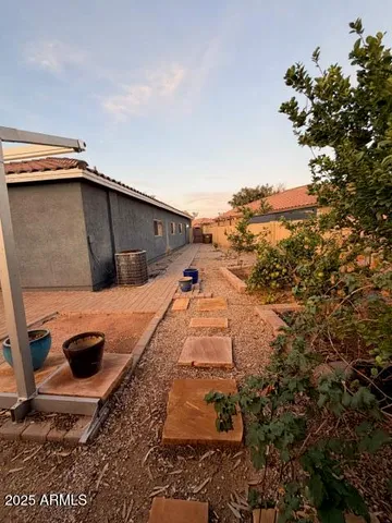 a backyard of a house with lots of green space