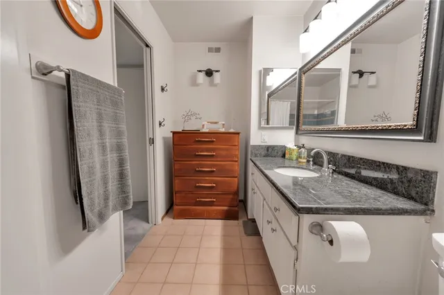 a room with lots of potted plants