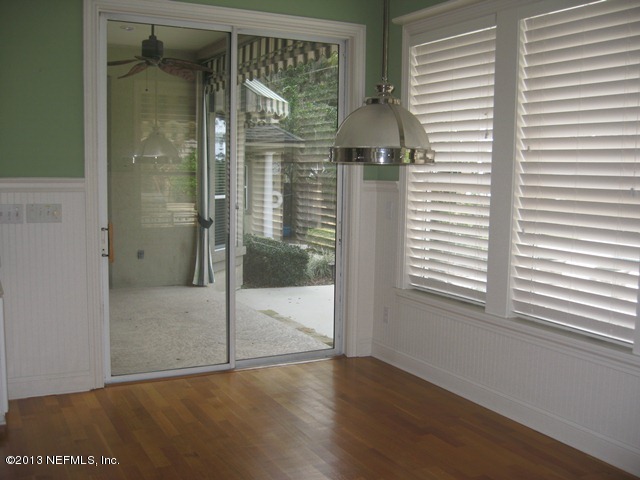 11860 Mandarin Road Jacksonville, FL 32223 - Photo 11 of 43 a view of a bathroom with a glass door