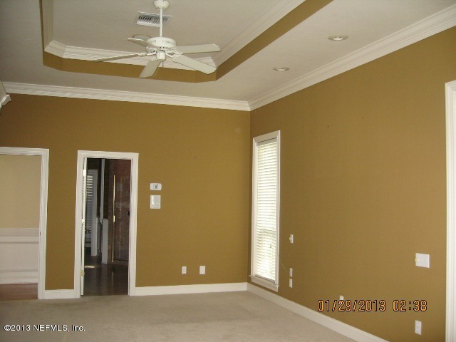 11860 Mandarin Road Jacksonville, FL 32223 - Photo 16 of 43 a view of a livingroom with a chandelier