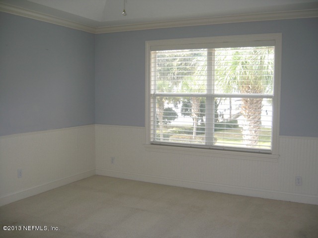 11860 Mandarin Road Jacksonville, FL 32223 - Photo 22 of 43 a view of an empty room with a window