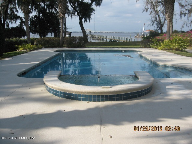 11860 Mandarin Road Jacksonville, FL 32223 - Photo 30 of 43 a view of a swimming pool with a yard