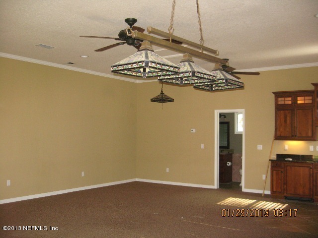 11860 Mandarin Road Jacksonville, FL 32223 - Photo 35 of 43 a view of a room with a garage