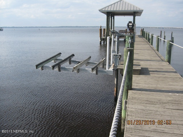 11860 Mandarin Road Jacksonville, FL 32223 - Photo 39 of 43 a room with gym equipment and stairs