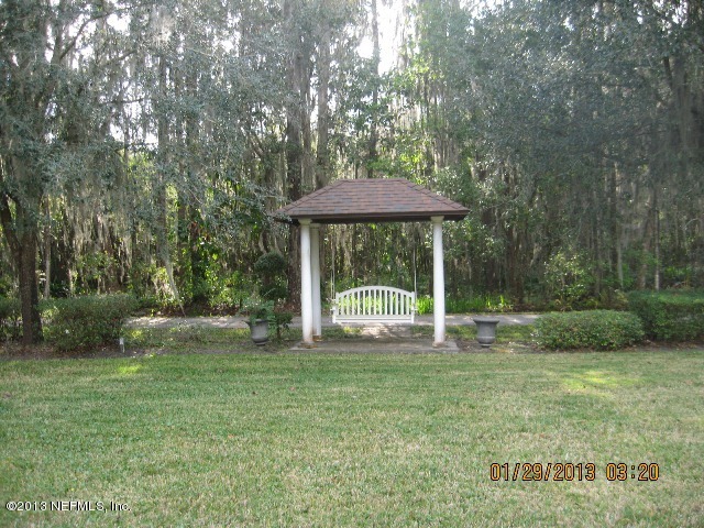 11860 Mandarin Road Jacksonville, FL 32223 - Photo 43 of 43 a view of a house with backyard