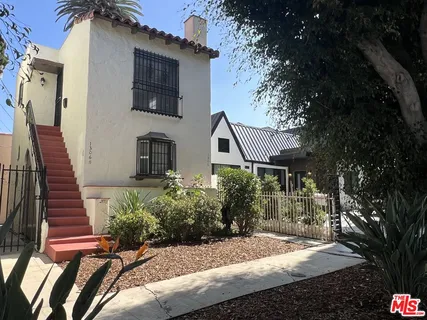 a house view with a outdoor space