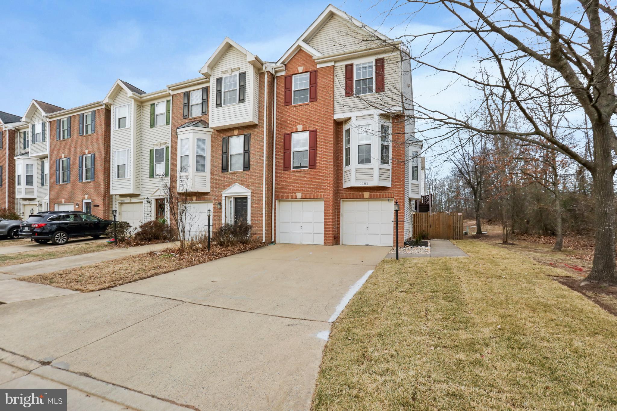 20381 Farmgate Terrace Ashburn, VA 20147 - Photo 1 of 31 a view of a building with a street