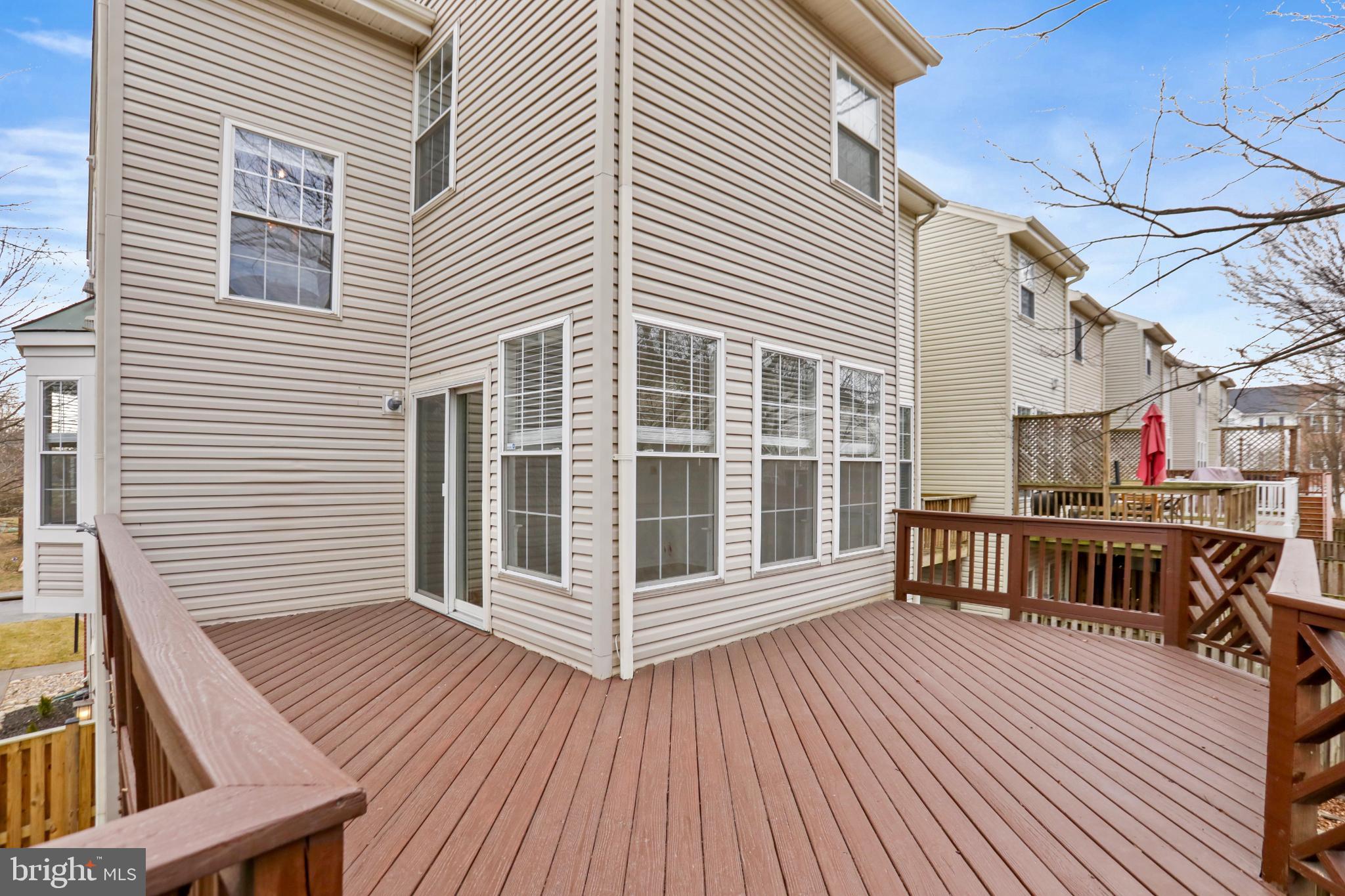 20381 Farmgate Terrace Ashburn, VA 20147 - Photo 11 of 31 a view of a house with pool and wooden floor