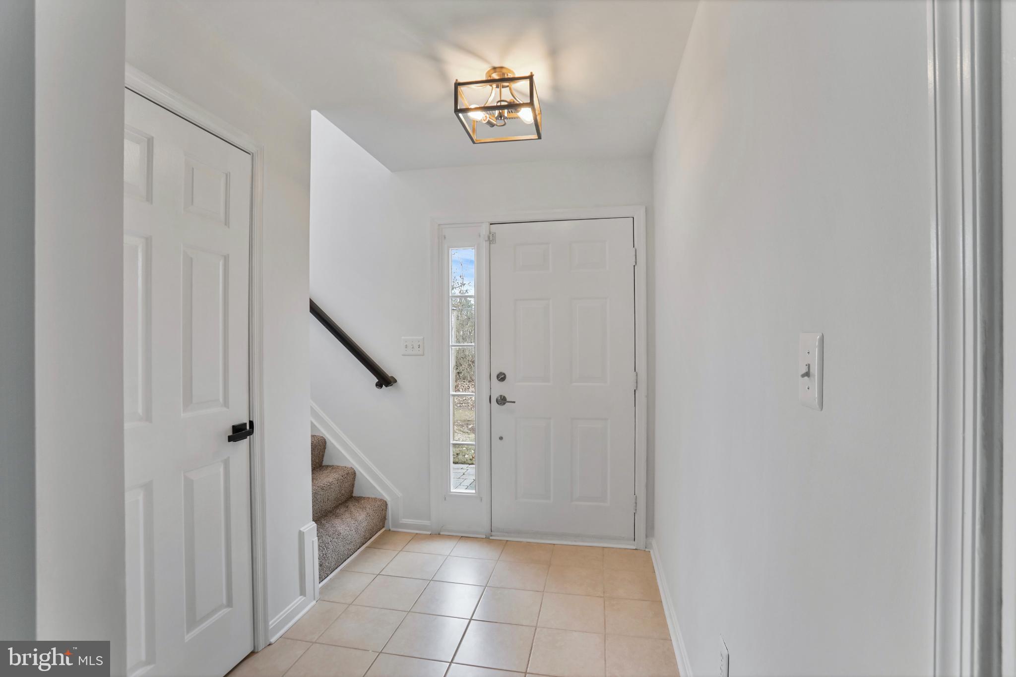 20381 Farmgate Terrace Ashburn, VA 20147 - Photo 2 of 31 a view of an entryway with hallway