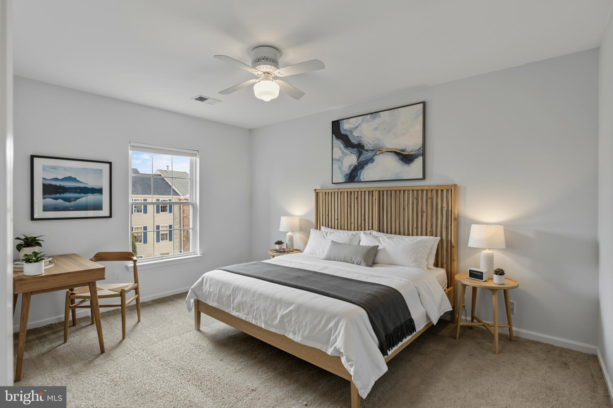 20381 Farmgate Terrace Ashburn, VA 20147 - Photo 20 of 31 a bedroom with a bed and lamp on dresser