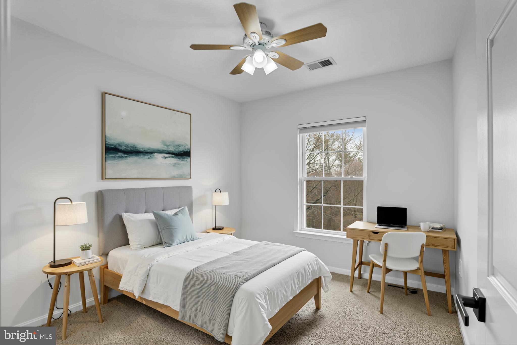 20381 Farmgate Terrace Ashburn, VA 20147 - Photo 23 of 31 a bedroom with a bed and a window