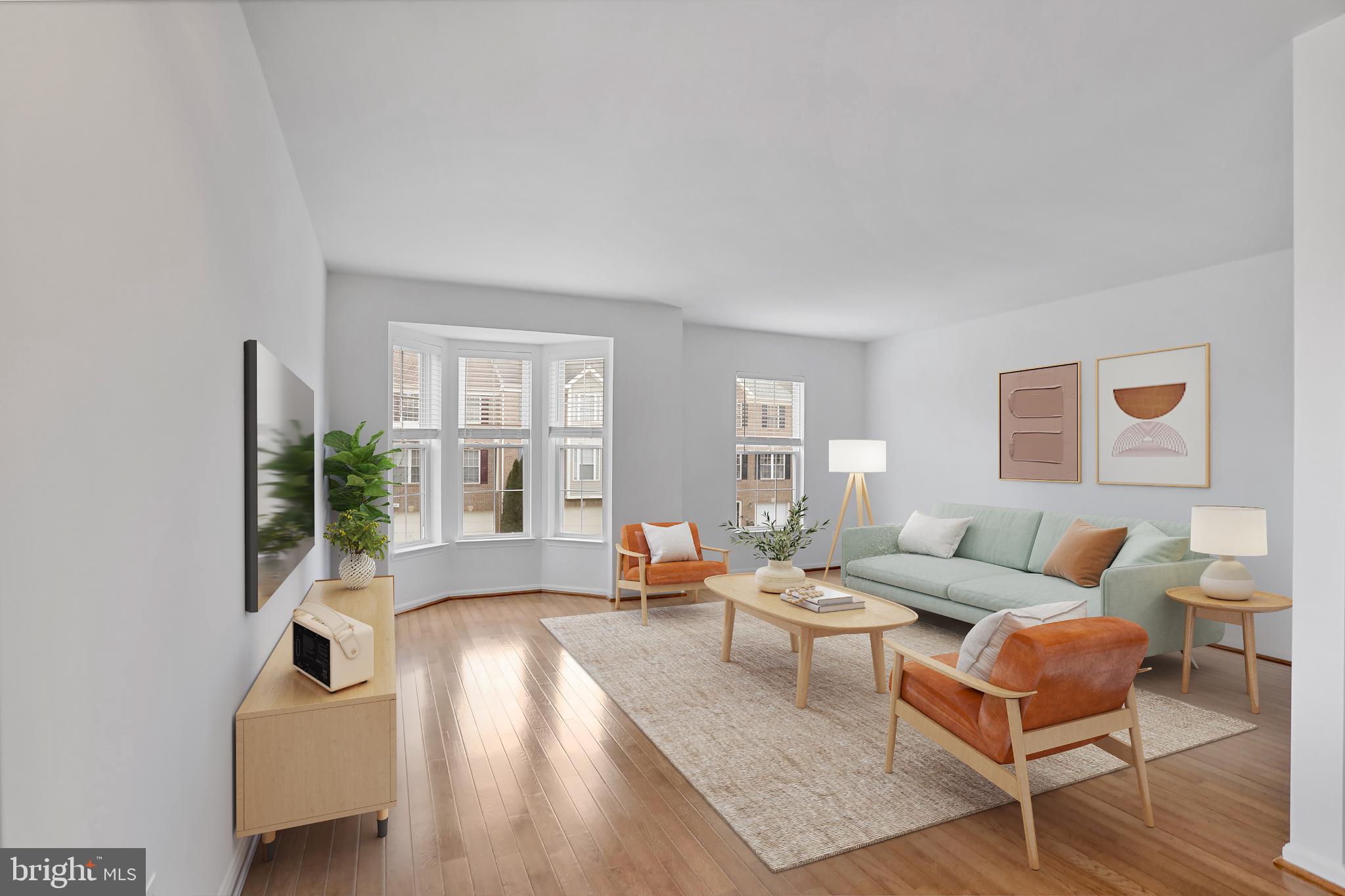 20381 Farmgate Terrace Ashburn, VA 20147 - Photo 5 of 31 a living room with furniture and a large window