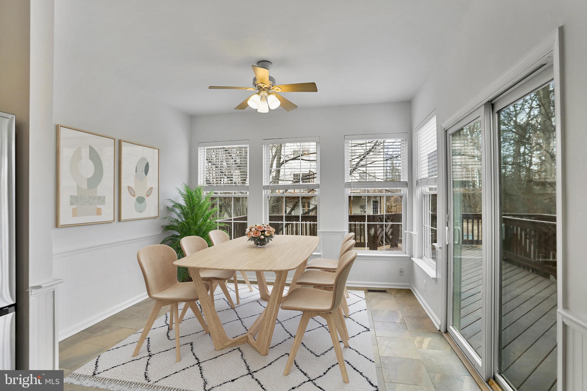 20381 Farmgate Terrace Ashburn, VA 20147 - Photo 9 of 31 a view of a dining room with furniture window and outside view