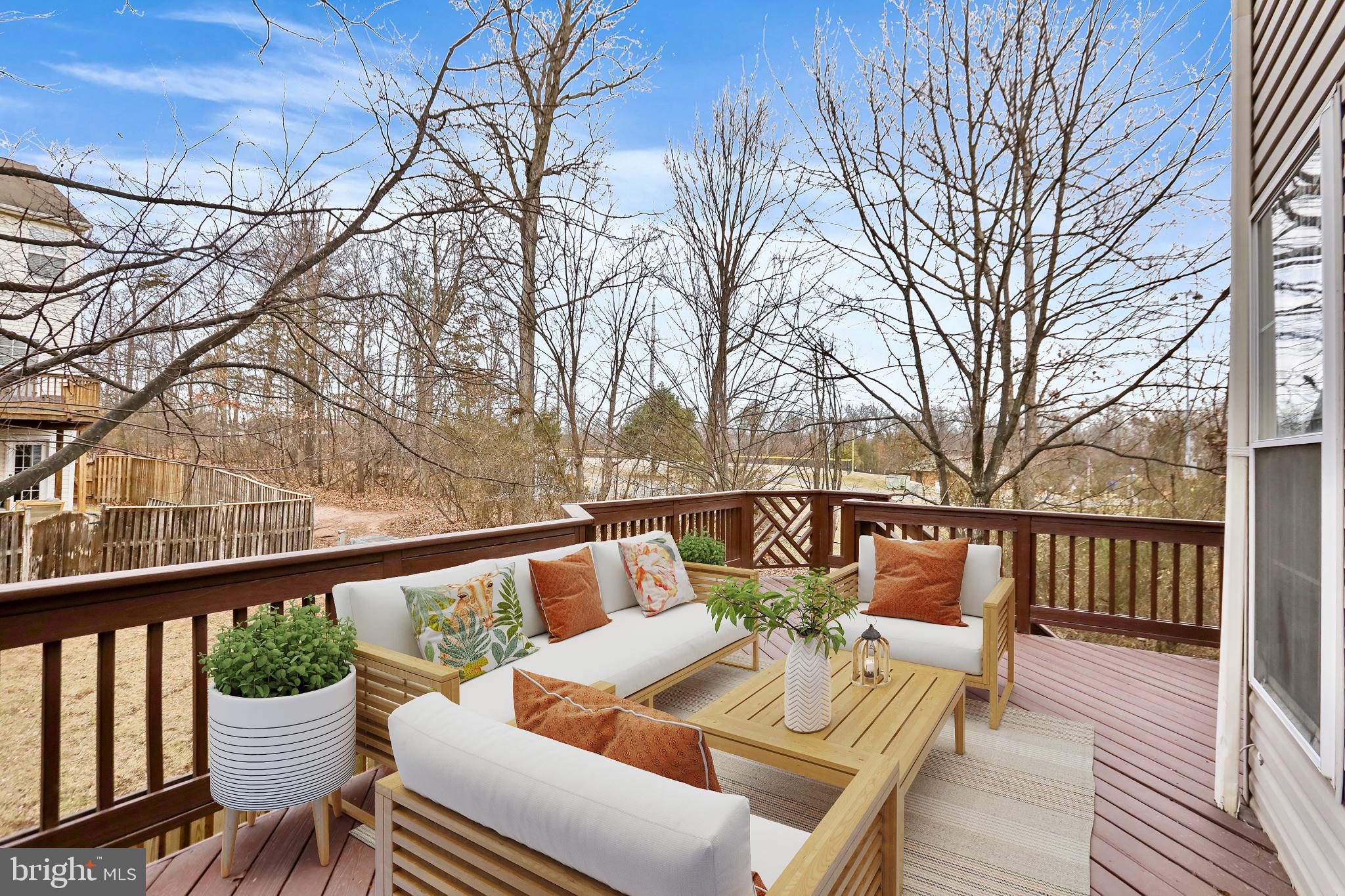 20381 Farmgate Terrace Ashburn, VA 20147 - Photo 10 of 31 a view of balcony with wooden floor and outdoor seating