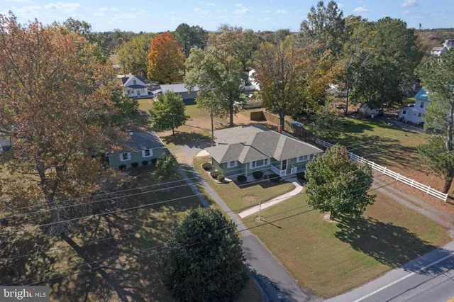 a view of a patio in backyard